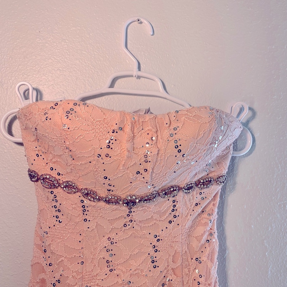 Brad: My Michelle Strapless Formal
NWT Size: 7 Color: Blush